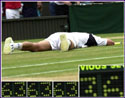 Goran lies flat out on Centre Court after winning the Men's Championship.
